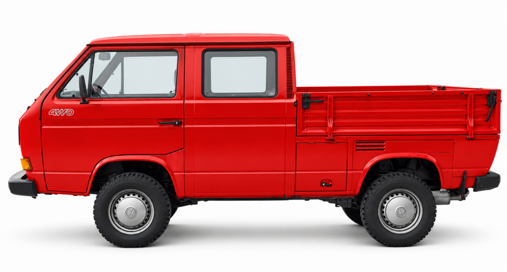 Feuerwehrroter VW T3 Syncro Doka 4x4 mit Doppelkabine, Pritsche und Geländereifen in der Seitenansicht auf weißem Hintergrund. Basisfahrzeug für unser geplantes Elektrocamper-Projekt.
